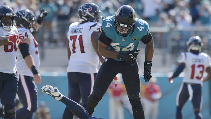 Jacksonville Jaguars linebacker Travon Walker (44) slings Houston Texans quarterback Davis Mills (10) to the turf after he released the ball during mid fourth quarter action. The Jacksonville Jaguars hosted the Houston Texans at TIAA Bank Field in Jacksonville, FL Sunday, October 9, 2022. The Jaguars fell to the Texans with a final score of 13 to 6.[Bob Self/Florida Times-Union]Jki 101022 Bs Jaguars Vs T 13