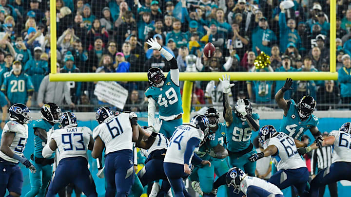 Jacksonville Jaguars defensive end Arden Key (49) fails to block a field goal by Tennessee Titans place kicker Randy Bullock (14) as the clock ran out on the first half. The Jacksonville Jaguars hosted the Tennessee Titans to decide the AFC South championship at TIAA Bank Field in Jacksonville, FL, Saturday, January 7, 2023. The Jaguars went into the half trailing 7 to 13. [Bob Self/Florida Times-Union]

Jki 010723 Bs Jaguars Vs Titans 28