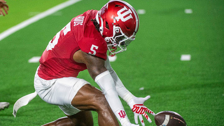 Indiana's D'Angelo Ponds (5) picks up a blocked punt during the Indiana versus Illinois football game at Memorial Stadium on Saturday, Sept. 20, 2025 Indiana's D'Angelo Ponds (5) picks up a blocked punt during the Indiana versus Illinois football game at Memorial Stadium on Saturday, Sept. 20, 2025