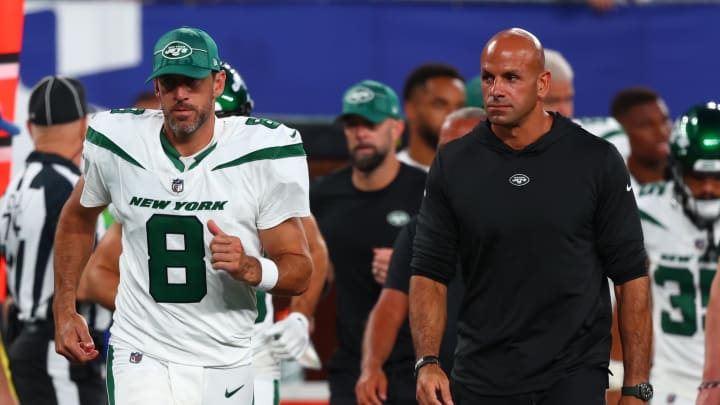 Aug 26, 2023; East Rutherford, New Jersey, USA; New York Jets quarterback Aaron Rodgers (8) and head coach Robert Saleh leave the field after the first half of their game against the New York Giants at MetLife Stadium. 