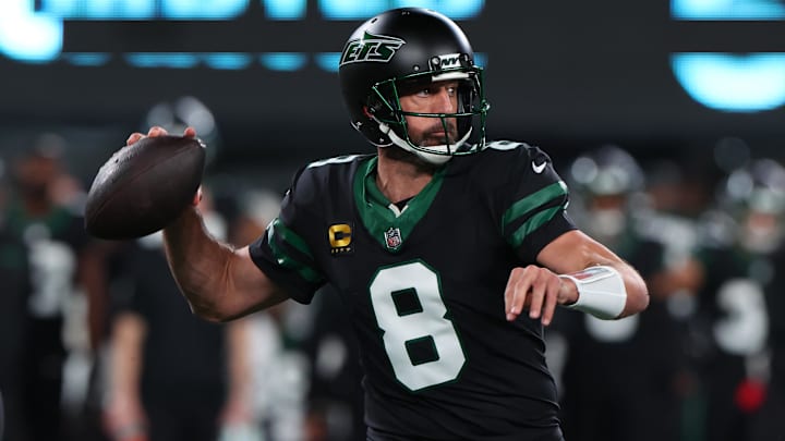 Oct 31, 2024; East Rutherford, New Jersey, USA; New York Jets quarterback Aaron Rodgers (8) throws a pass against the Houston Texans during the first half at MetLife Stadium.
