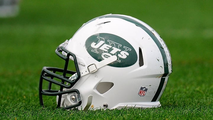 July 29, 2012; Cortland, NY, USA; A general view of a New York Jets helmet on the ground during training camp at SUNY Cortland. Mandatory Credit: Rich Barnes-Imagn Images