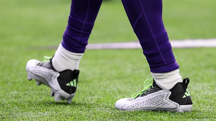 Dec 8, 2024; Minneapolis, Minnesota, USA; The cleats worn by Minnesota Vikings wide receiver Jordan Addison (3) are seen before the game against the Atlanta Falcons at U.S. Bank Stadium.
