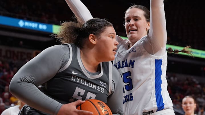 Iowa State Cyclones' center Audi Crooks (55) looks for a drive around BYU Cougars forward Emma Calvert (25) during the fourth quarter in the Big-12 women’s basketball at Hilton Coliseum on Wednesday, Jan. 22, 2025, in Ames, Iowa.