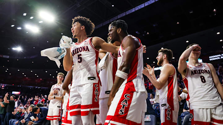Dec 22, 2025; Tucson, Arizona, USA; Arizona Wildcats guard Brayden Burries (5) and teammates celebrate at the bench during the second half of the game against the Bethune-Cookman Wildcats at McKale Memorial Center. Mandatory Credit: Aryanna Frank-Imagn Images