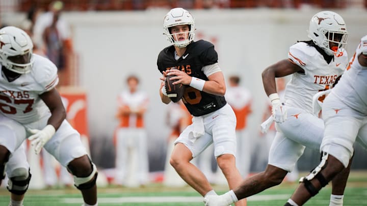Texas Longhorns quarter back Arch Manning (6) looks for a pass during the Longhorns' spring Orange and White game at Darrell K Royal Texas Memorial Stadium in Austin, Texas, April 20, 2024.