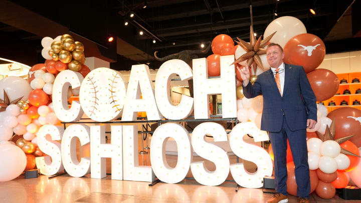 University of Texas baseball coach Jim Schlossnagle poses for photos at his introductory news conference at the Frank Denius Family University Hall of Fame Wednesday June 26, 2024. University of Texas baseball coach Jim Schlossnagle poses for photos at his introductory news conference at the Frank Denius Family University Hall of Fame Wednesday June 26, 2024.