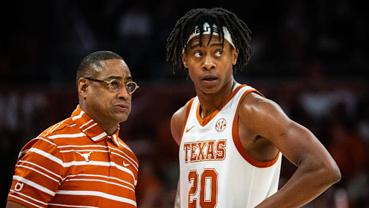 Texas Longhorns head coach Rodney Terry speaks with guard Tre Johnson (20) during a break in the second half of the Longhorns' game against the Chicago State Cougars at the Moody Center in Austin, Nov. 12, 2024. Texas Longhorns head coach Rodney Terry speaks with guard Tre Johnson (20) during a break in the second half of the Longhorns' game against the Chicago State Cougars at the Moody Center in Austin, Nov. 12, 2024.