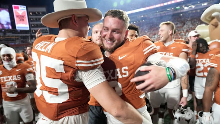 Texas Longhorns quarterback Quinn Ewers (3) hugs Texas Longhorns tight end Gunnar Helm (85) at the end of the game against Kentucky Wildcats in a NCAA college football game at Darrell K Royal Texas Memorial Stadium, Austin, Texas, Saturday, Nov 24, 2024. Texas Longhorns quarterback Quinn Ewers (3) hugs Texas Longhorns tight end Gunnar Helm (85) at the end of the game against Kentucky Wildcats in a NCAA college football game at Darrell K Royal Texas Memorial Stadium, Austin, Texas, Saturday, Nov 24, 2024.