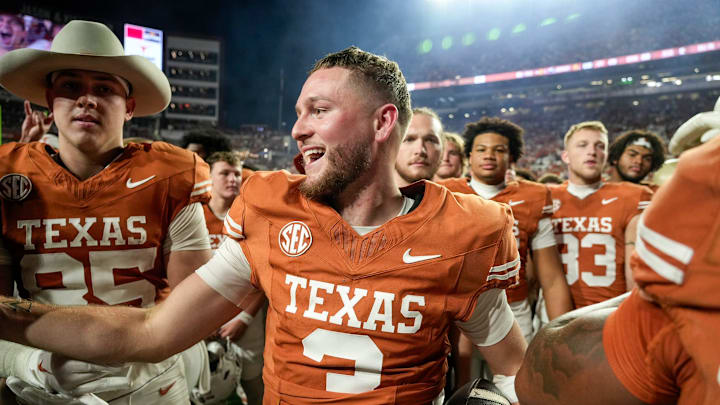 Texas Longhorns quarterback Quinn Ewers (3) celebrates a win over Kentucky Wildcats 31-14 in a NCAA college football game at Darrell K Royal Texas Memorial Stadium, Austin, Texas, Saturday, Nov 24, 2024. Texas Longhorns quarterback Quinn Ewers (3) celebrates a win over Kentucky Wildcats 31-14 in a NCAA college football game at Darrell K Royal Texas Memorial Stadium, Austin, Texas, Saturday, Nov 24, 2024.