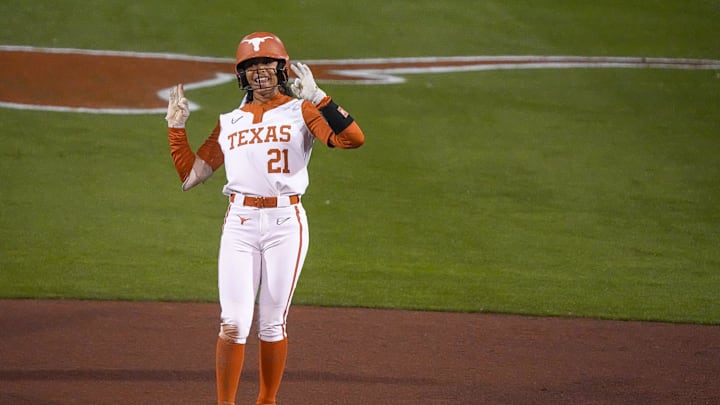 Texas Longhorns outfielder Kayden Henry (21) celebrates a hit for a double during the game against Texas Tech on day one of the Bevo Classic at Red and Charline McCombs field on Friday, February. 14, 2025 in Austin.