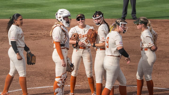 Longhorn players meet on the mound during the game against LSU at Red & Charline McCombs Field on Thursday, April 17, 2025 in Austin.