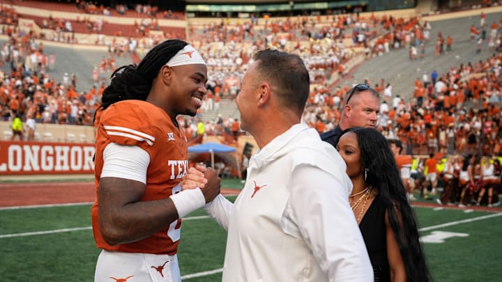 Texas Longhorns quarterback Maalik Murphy celebrates head coach Steve Sarkisian aftre the win over the BYU Cougars at Royal-Memorial Stadium on Saturday October 28, 2023.
