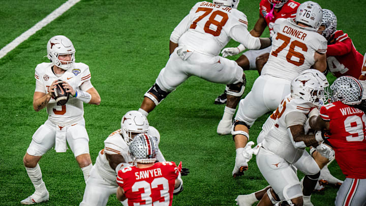 Texas Longhorns quarterback Quinn Ewers (3) looks for a pass in the first quarter as the Texas Longhorns play the Ohio State Buckeyes in the Cotton Bowl College Football Playoff semi-final at AT&T Stadium in Dallas, Texas, Jan. 10, 2025.