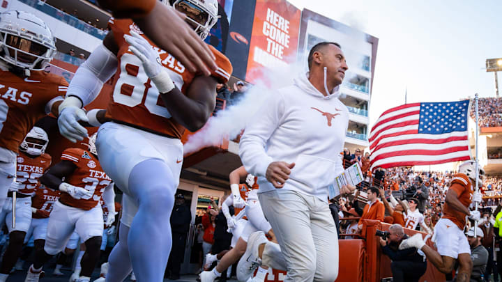 Texas Longhorns head coach Steve Sarkisian leads the team onto the field as the Texas Longhorns prepare to play the Clemson Tigers in the first round of the College Football Playoffs at Darrell K Royal Texas Memorial Stadium in Austin, Texas, Dec. 21, 2024.