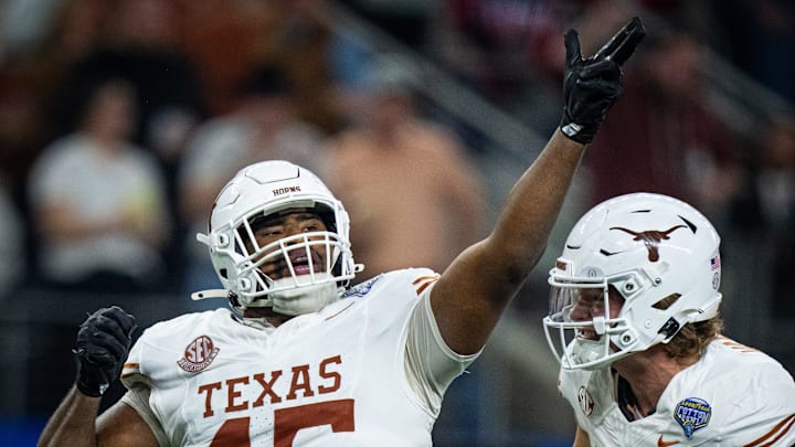 Texas Longhorns defensive lineman Vernon Broughton (45) celebrates a quarterback sack in the third quarter as the Texas Longhorns play the Ohio State Buckeyes in the Cotton Bowl College Football Playoff semi-final at AT&T Stadium in Dallas, Texas, Jan. 10, 2025.
