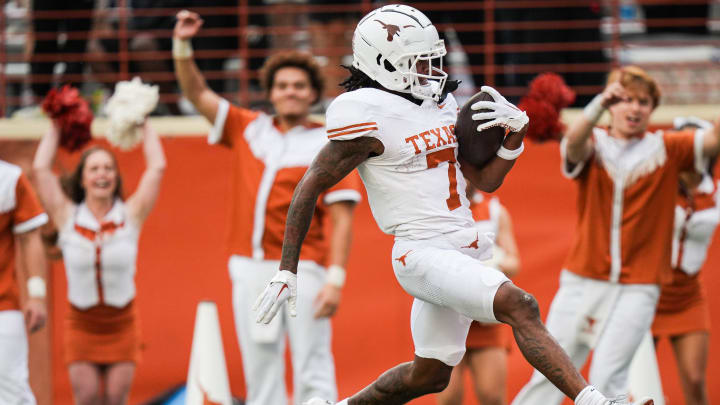 Texas White wide receiver Isaiah Bond runs the ball in to score a touchdown during the fourth quarter of a spring game. 