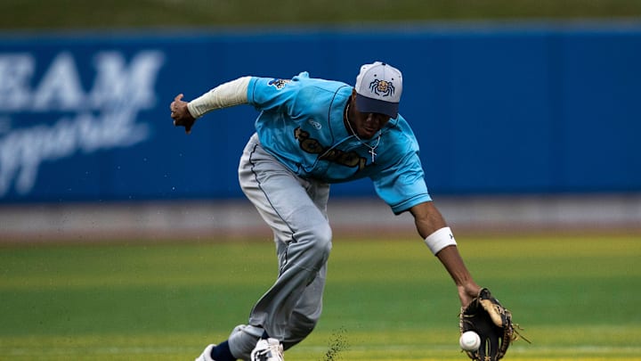 Fond du Lac Dock Spiders Chandler Simpson (14) scoops up the ball in the fourth inning Booyah at Capital Credit Union Park, Tuesday, June 1, 2021, Green Bay, Wis. 