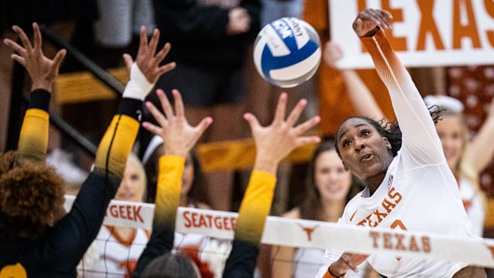 Texas Longhorns opposite hitter Reagan Rutherford (10) puts the ball over the net during the Longhorns' match-up with the Missouri Tigers at the Gregory Gym in Austin, Nov. 1, 2024. Texas Longhorns opposite hitter Reagan Rutherford (10) puts the ball over the net during the Longhorns' match-up with the Missouri Tigers at the Gregory Gym in Austin, Nov. 1, 2024.