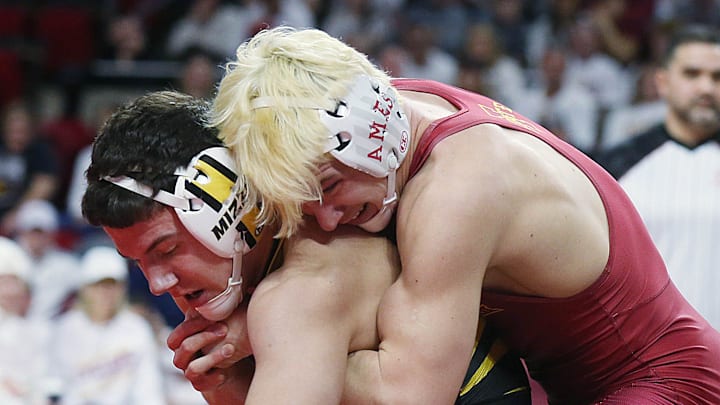 Iowa State Cyclones Casey Swiderski takes down Missouri Tigers' Zeke Seltzer during their 149-pound wrestling in the Big-12-conference showdown at Hilton Coliseum on Sunday, Feb. 25, 2024, in Ames, Iowa Iowa State Cyclones Casey Swiderski takes down Missouri Tigers' Zeke Seltzer during their 149-pound wrestling in the Big-12-conference showdown at Hilton Coliseum on Sunday, Feb. 25, 2024, in Ames, Iowa