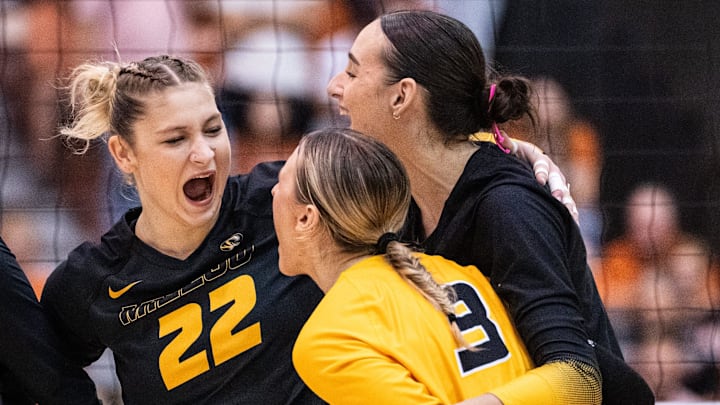 Missouri Tigers setter Marina Crownover (22), a former Texas Longhorn, reacts with her teammates, including middle blocker Morgan Isenberg (9) after scoring a point during the Longhorns' match-up with the Missouri Tigers at the Gregory Gym in Austin, Nov. 1, 2024. Missouri Tigers setter Marina Crownover (22), a former Texas Longhorn, reacts with her teammates, including middle blocker Morgan Isenberg (9) after scoring a point during the Longhorns' match-up with the Missouri Tigers at the Gregory Gym in Austin, Nov. 1, 2024.