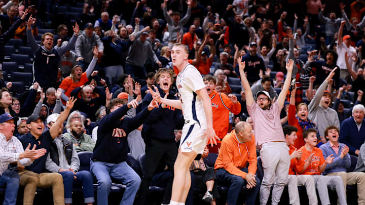 Mar 4, 2025; Charlottesville, Virginia, USA; Virginia Cavaliers guard Andrew Rohde (4) celebrates in the second half against the Florida State Seminoles at John Paul Jones Arena. Mandatory Credit: Emily Faith Morgan-Imagn Images
