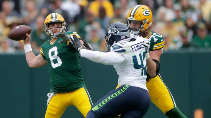 Green Bay Packers guard Royce Newman (70) blocks Seattle Seahawks defensive end Jordan Ferguson (42) during their preseason game last year.