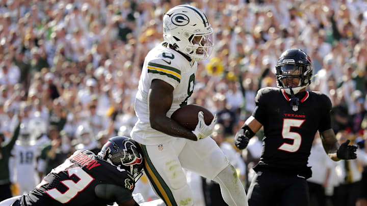 Green Bay Packers running back Josh Jacobs hops into the end zone for his first career receiving touchdown vs. the Texans.