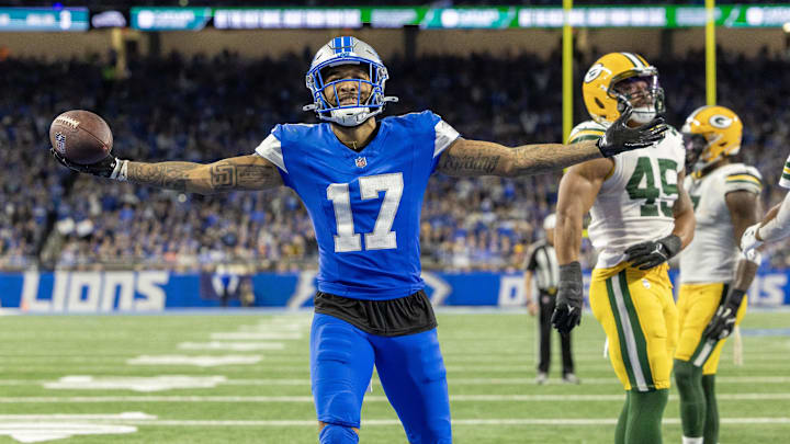 Detroit Lions wide receiver Tim Patrick (17) catches a pass for a touchdown in front of Green Bay Packers linebacker Eric Wilson. Detroit Lions wide receiver Tim Patrick (17) catches a pass for a touchdown in front of Green Bay Packers linebacker Eric Wilson.