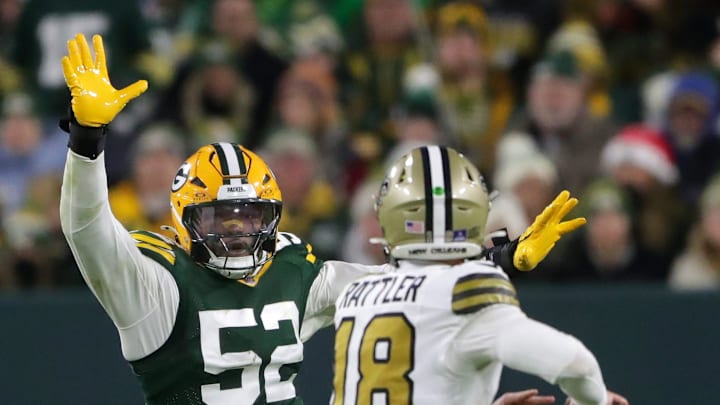 Green Bay Packers defensive end Rashan Gary (52) rushes New Orleans Saints quarterback Spencer Rattler.
