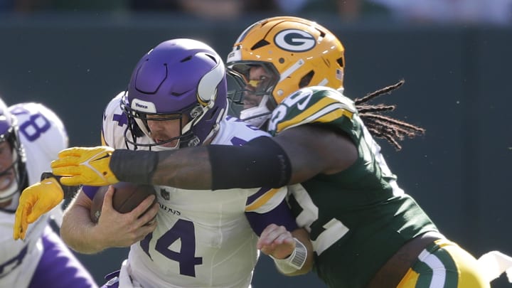 Green Bay Packers defensive end Rashan Gary (52) sacks Minnesota Vikings quarterback Sam Darnold.