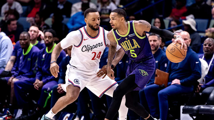 Dec 30, 2024; New Orleans, Louisiana, USA; New Orleans Pelicans guard Dejounte Murray (5) dribbles against LA Clippers guard Norman Powell (24) during the second half at Smoothie King Center. Mandatory Credit: Stephen Lew-Imagn Images Dec 30, 2024; New Orleans, Louisiana, USA; New Orleans Pelicans guard Dejounte Murray (5) dribbles against LA Clippers guard Norman Powell (24) during the second half at Smoothie King Center. Mandatory Credit: Stephen Lew-Imagn Images