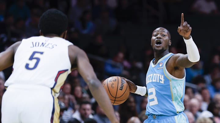 Dec 15, 2023; Charlotte, North Carolina, USA; Charlotte Hornets guard Terry Rozier (3) calls a play as he brings the ball upcourt against New Orleans Pelicans forward Herbert Jones (5) during the first quarterat Spectrum Center. Mandatory Credit: Nell Redmond-Imagn Images Dec 15, 2023; Charlotte, North Carolina, USA; Charlotte Hornets guard Terry Rozier (3) calls a play as he brings the ball upcourt against New Orleans Pelicans forward Herbert Jones (5) during the first quarterat Spectrum Center. Mandatory Credit: Nell Redmond-Imagn Images