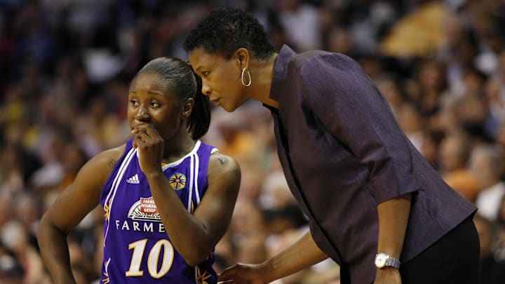 July 24, 2010; Uncasville, CT, USA; Los Angeles Sparks head coach Jennifer Gillom talks with guard Andrea Riley (10) during a break as they take on the Connecticut Sun during the first half at the Mohegan Sun Arena. Mandatory Credit: David Butler II-Imagn Images July 24, 2010; Uncasville, CT, USA; Los Angeles Sparks head coach Jennifer Gillom talks with guard Andrea Riley (10) during a break as they take on the Connecticut Sun during the first half at the Mohegan Sun Arena. Mandatory Credit: David Butler II-Imagn Images