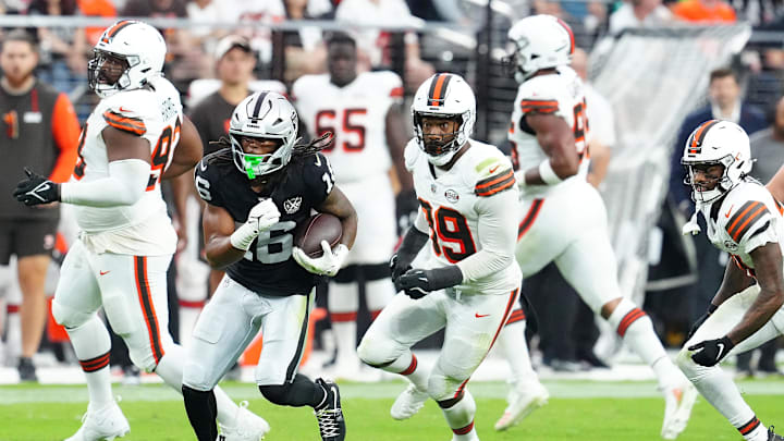Sep 29, 2024; Paradise, Nevada, USA; Las Vegas Raiders wide receiver Jakobi Meyers (16) gains yardage against the Cleveland Browns during the fourth quarter at Allegiant Stadium. Mandatory Credit: Stephen R. Sylvanie-Imagn Images Sep 29, 2024; Paradise, Nevada, USA; Las Vegas Raiders wide receiver Jakobi Meyers (16) gains yardage against the Cleveland Browns during the fourth quarter at Allegiant Stadium. Mandatory Credit: Stephen R. Sylvanie-Imagn Images
