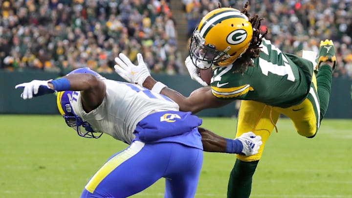 Green Bay Packers wide receiver Davante Adams (17) against Los Angeles Rams cornerback Darious Williams (11) during their football game on Sunday November 28, 2021, at Lambeau Field in Green Bay, Wis.