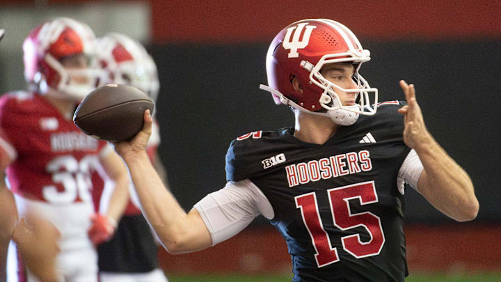 Indiana's Fernando Mendoza (15) throws a pass during spring football practice on Tuesday, April 8, 2025. Indiana's Fernando Mendoza (15) throws a pass during spring football practice on Tuesday, April 8, 2025.