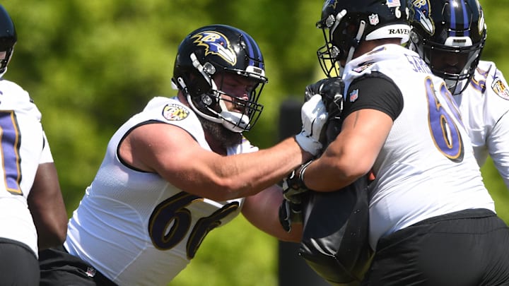 May 15, 2021; Baltimore, Maryland, USA;  Ben Cleveland #66 of the Baltimore Ravens runs drills during rookie Camp.   Mandatory Credit: Mitchell Layton-Imagn Images