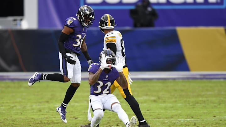 Nov 1, 2020; Baltimore, Maryland, USA;  Baltimore Ravens free safety DeShon Elliott (32) celebrates with strong safety Chuck Clark (36) after sacking Pittsburgh Steelers quarterback Ben Roethlisberger (not pictured) in the second quarter at M&T Bank Stadium. Mandatory Credit: Mitchell Layton-Imagn Images