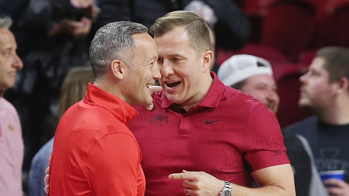 Iowa State Cyclones men's basketball head coach T. J. Otzelberger greets Texas Tech Red Raiders men's basketball head coach Grant McCasland. Iowa State Cyclones men's basketball head coach T. J. Otzelberger greets Texas Tech Red Raiders men's basketball head coach Grant McCasland.