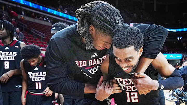 Texas Tech Red Raiders guard Donovan Atwell (12) celebrates with team mates after winning 82-73 over Iowa State in the Big-12 conference men’s basketball showdown on Feb. 28, 2026, at Hilton Coliseum in Ames, Iowa.