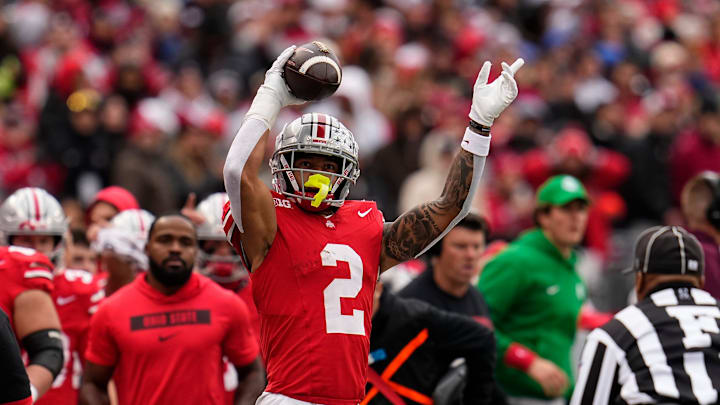 Ohio State Buckeyes wide receiver Emeka Egbuka (2) celebrates a first down catch during the second half of the NCAA football game against the Indiana Hoosiers at Ohio Stadium in Columbus on Saturday, Nov. 23, 2024. Ohio State won 38-15.