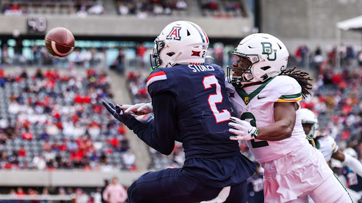 Nov 22, 2025; Tucson, Arizona, USA; Arizona Wildcats defensive back Treydan Stukes (2) intercepts the ball in the end zone during the fourth quarter of the game against the Baylor Bears at Casino Del Sol Stadium. Mandatory Credit: Aryanna Frank-Imagn Images Nov 22, 2025; Tucson, Arizona, USA; Arizona Wildcats defensive back Treydan Stukes (2) intercepts the ball in the end zone during the fourth quarter of the game against the Baylor Bears at Casino Del Sol Stadium. Mandatory Credit: Aryanna Frank-Imagn Images