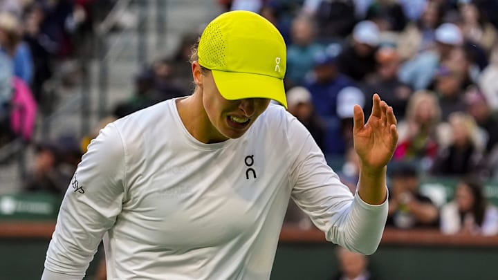 Iga Swiatek reacts to a point by Mirra Andreeva during the WTA semifinals at the BNP Paribas Open in Indian Wells, Calif., Friday, March 14, 2025. Iga Swiatek reacts to a point by Mirra Andreeva during the WTA semifinals at the BNP Paribas Open in Indian Wells, Calif., Friday, March 14, 2025.
