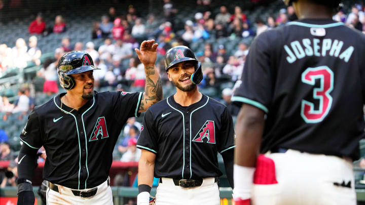 Arizona Diamondbacks Blaze Alexander (center) reacts after hitting a two-run home run against the Cleveland Guardians at Chase Field. Arizona Diamondbacks Blaze Alexander (center) reacts after hitting a two-run home run against the Cleveland Guardians at Chase Field.