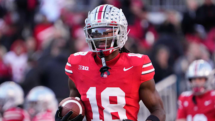 Nov 18, 2023; Columbus, Ohio, USA; Ohio State Buckeyes wide receiver Marvin Harrison Jr. (18) warms Nov 18, 2023; Columbus, Ohio, USA; Ohio State Buckeyes wide receiver Marvin Harrison Jr. (18) warms