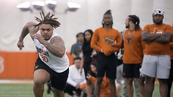Defensive lineman Byron Murphy runs through drills at Texas Longhorns Football Pro Day at Frank