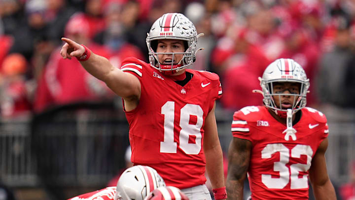 Ohio State Buckeyes quarterback Will Howard (18) motions at the line of scrimmage during the NCAA football game against the Indiana Hoosiers at Ohio Stadium in Columbus on Monday, Nov. 25, 2024. Ohio State won 38-15.