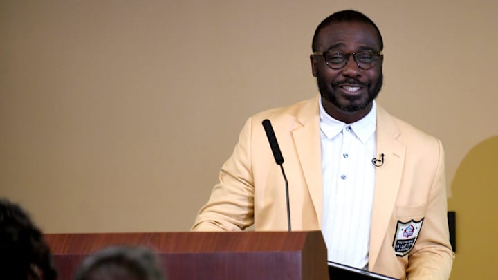 Faulk speaks during an event. 