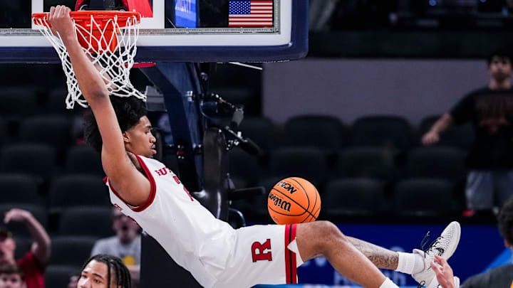 Rutgers Scarlet Knights guard Dylan Harper (2) dunks the ball